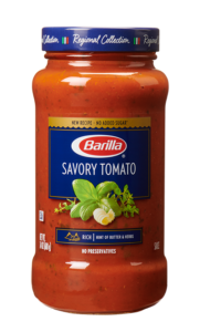 Pressure sensitive label on jar of tomato sauce